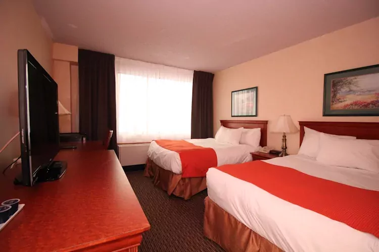 hotel chrome montreal - kamer 2 bed.webp